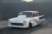 Purple and White 1955 Chevrolet Drag Car with checkered paint